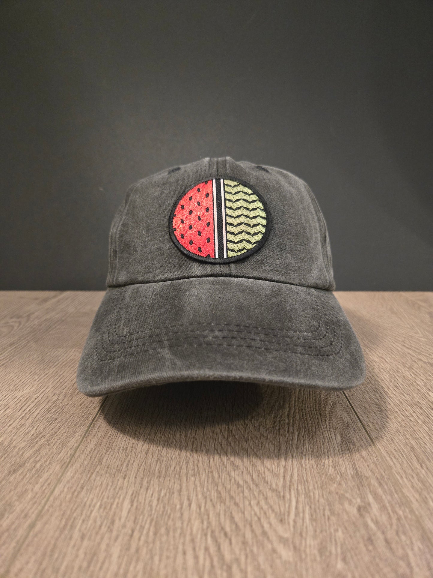 Palestinian Keffiyeh watermelon cotton cap with embroidered patch, representing cultural pride and heritage.