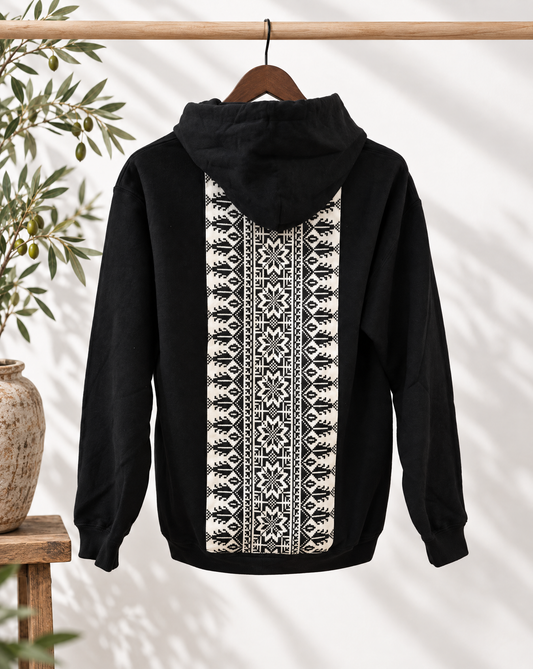 Black Tatreez Contrast Trim Hoodie shown with an olive tree on a white background