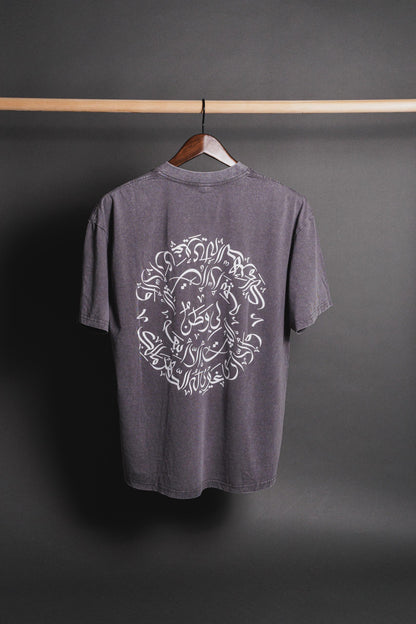 Gray Watan T-shirt with embroidered 'لي وطن' on the chest, representing Palestinian pride, heritage, and cultural identity.