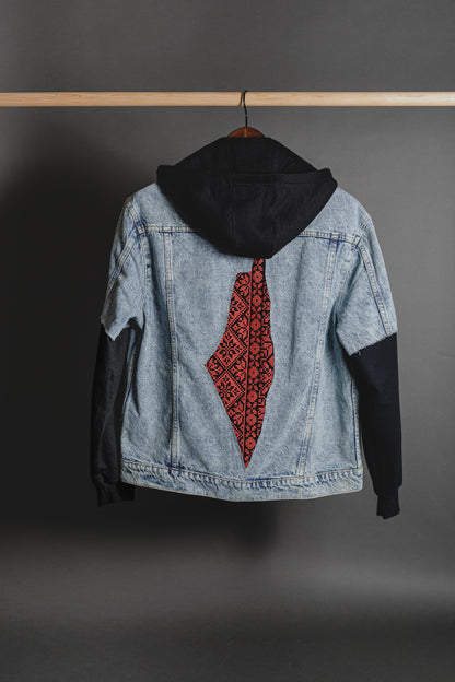 Front view of denim jacket with hand-cut Palestine map and tatreez details