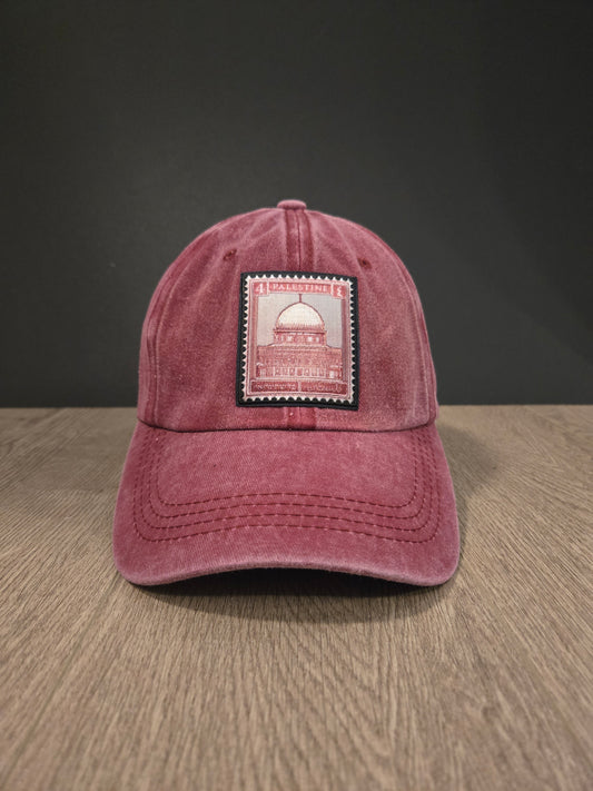 Unisex maroon cap with embroidered Palestine stamp featuring Dome of the Rock design