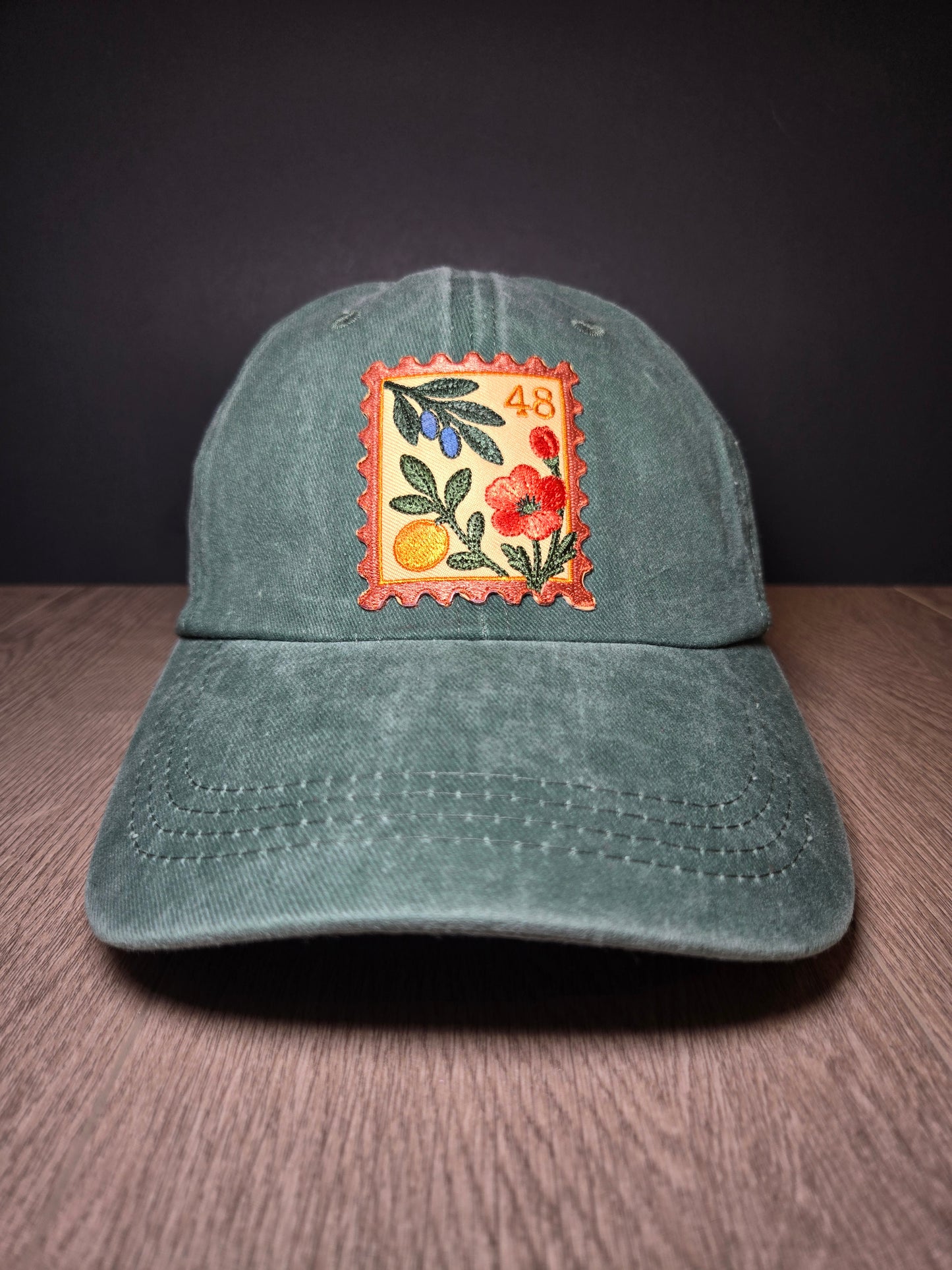 Gray unisex cap with embroidered Palestine postage stamp featuring floral design and the number 48