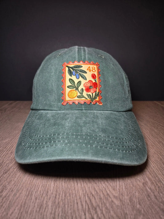 Gray unisex cap with embroidered Palestine postage stamp featuring floral design and the number 48