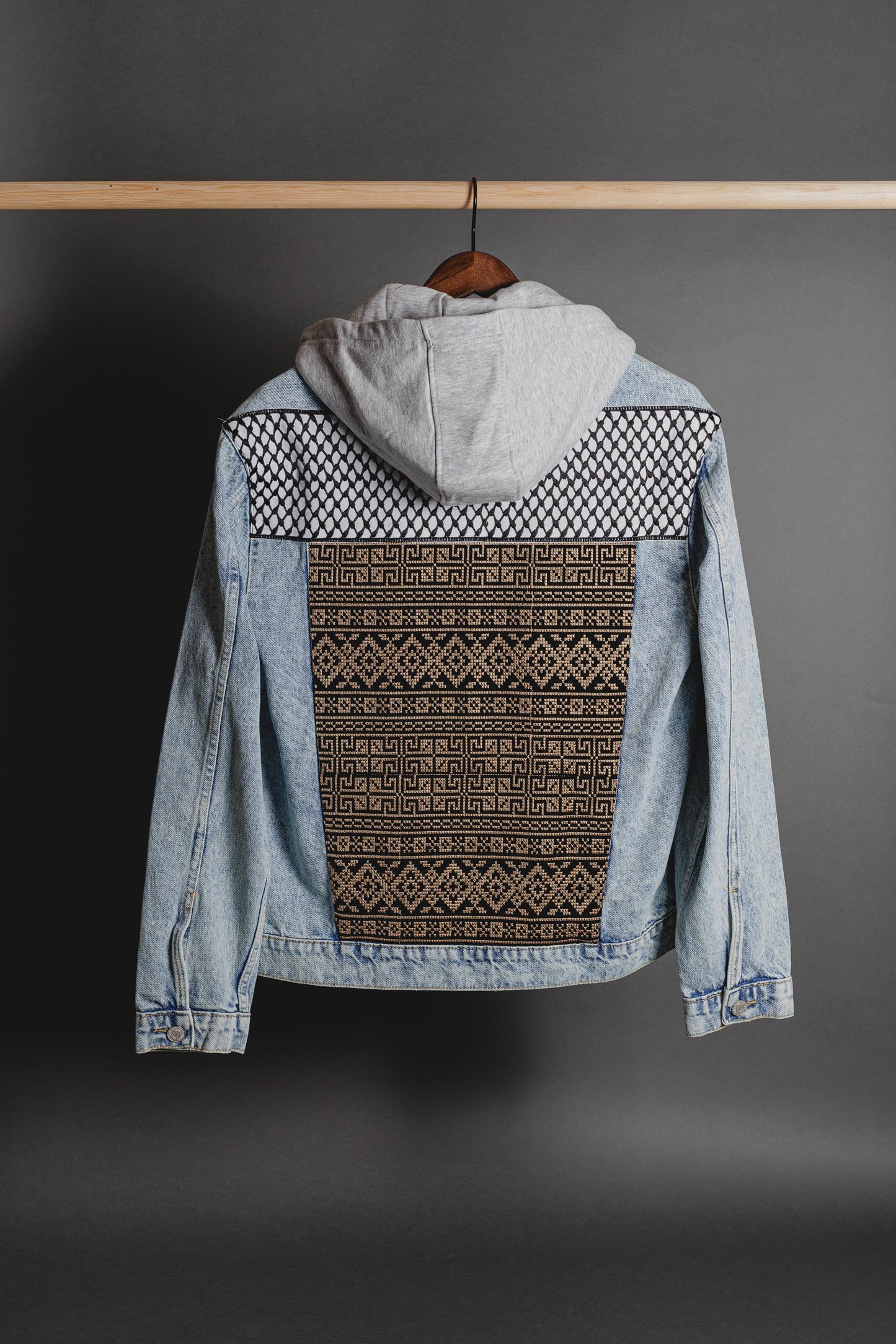 Inner stitching and lining detail of Keffiyeh denim jacket showing craftsmanship