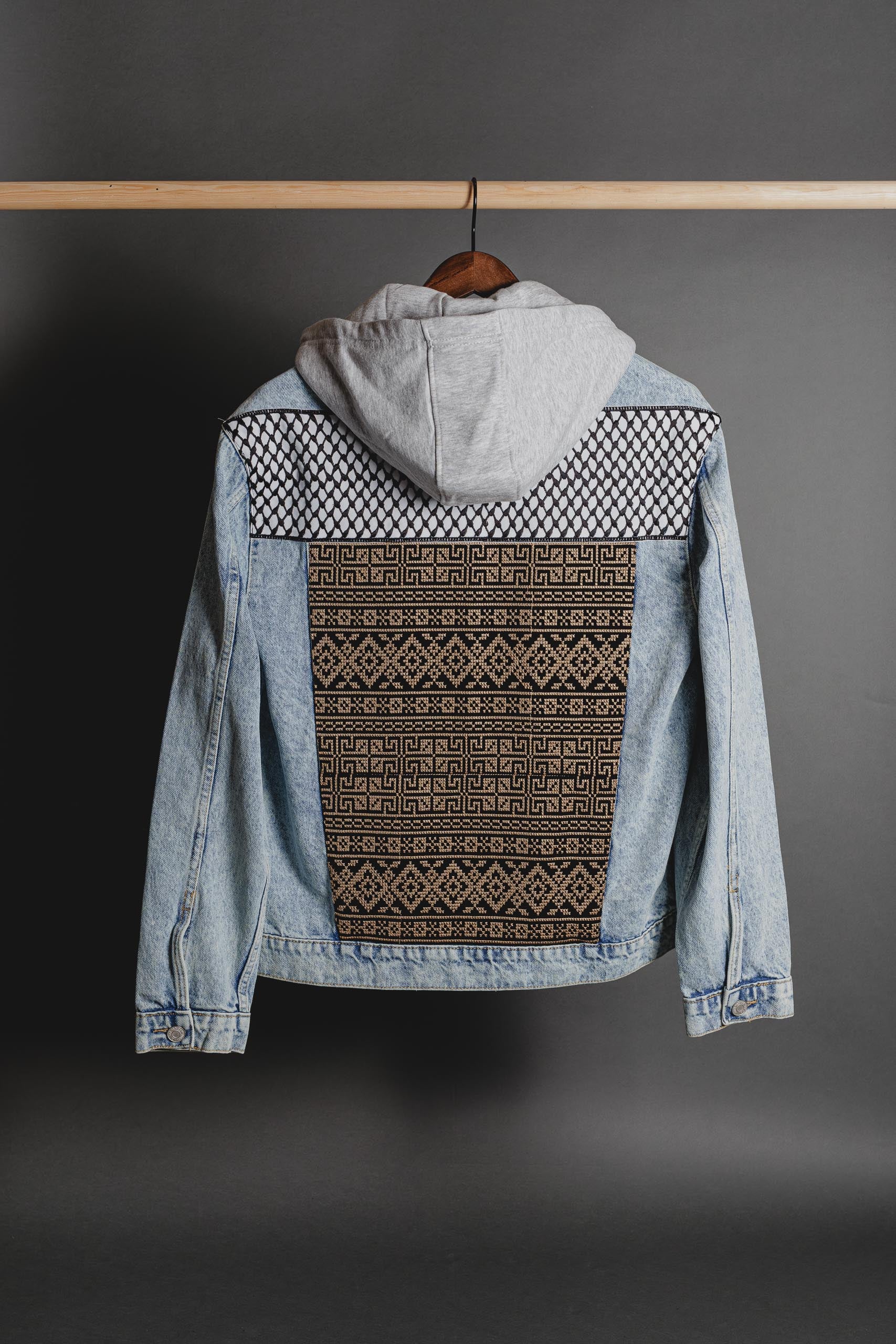 Inner stitching and lining detail of Keffiyeh denim jacket showing craftsmanship