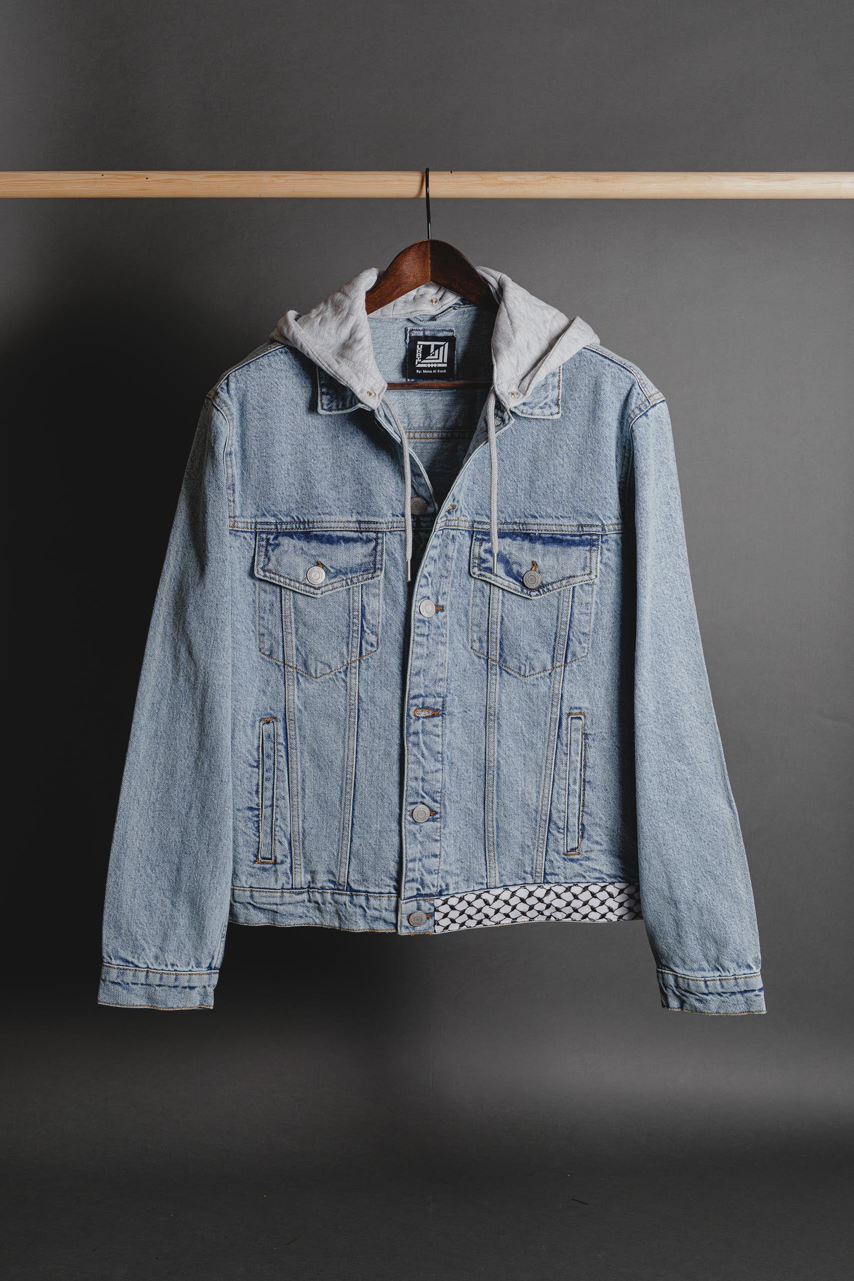 Side angle view of Palestinian Keffiyeh denim jacket showing fit and sleeve design