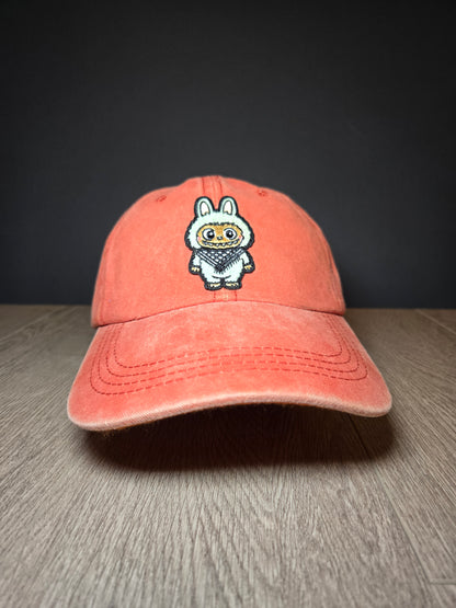 Pink bucket hat with embroidered Palestinian design, symbolizing cultural pride and style